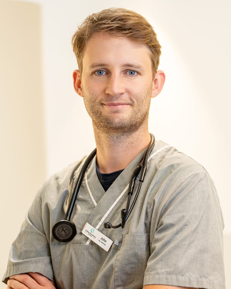 John, licensed veterinarian at AniMed Animal Hospital